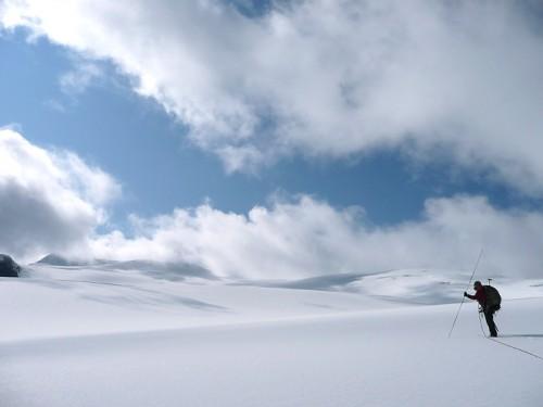 Matt probes for crevasses in the accumulation zone... we punched through a few times. 