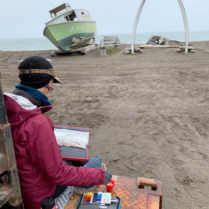 Sketching the whalebone arch, photo by Katie Morrison