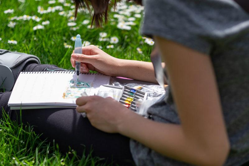 A young naturalist, photo by University Child Development School